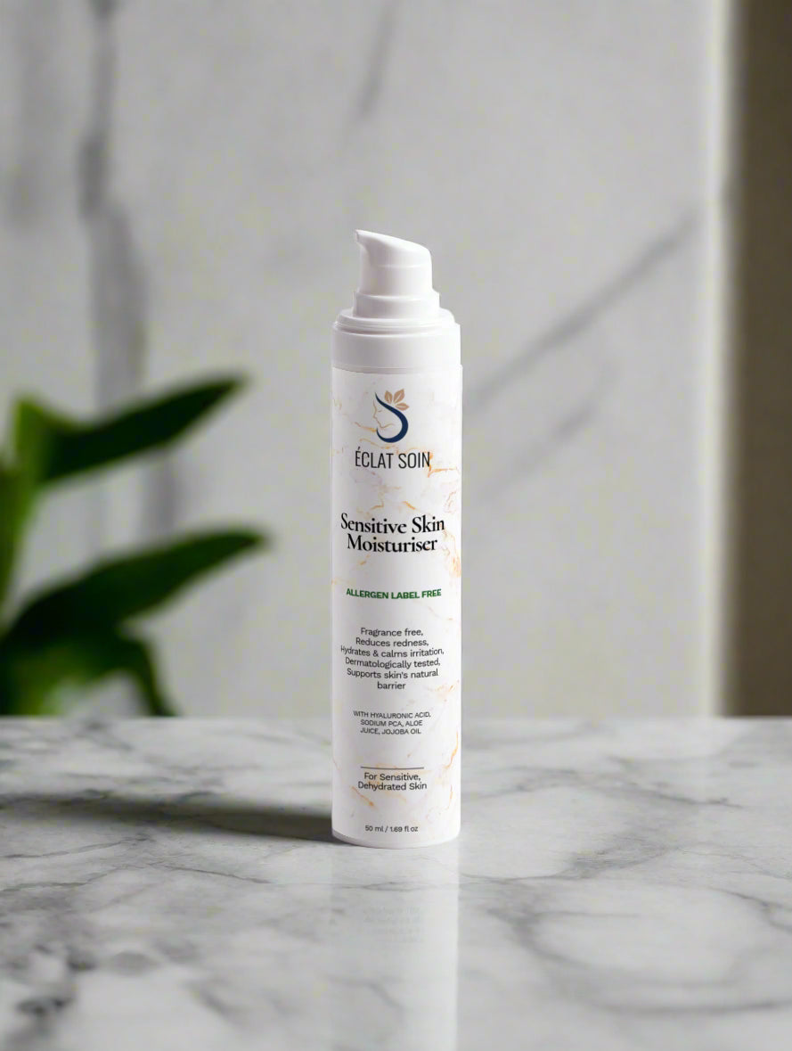 Eclat Soin Sensitive Skin Moisturiser in a sleek bottle on a marble surface for gentle hydration